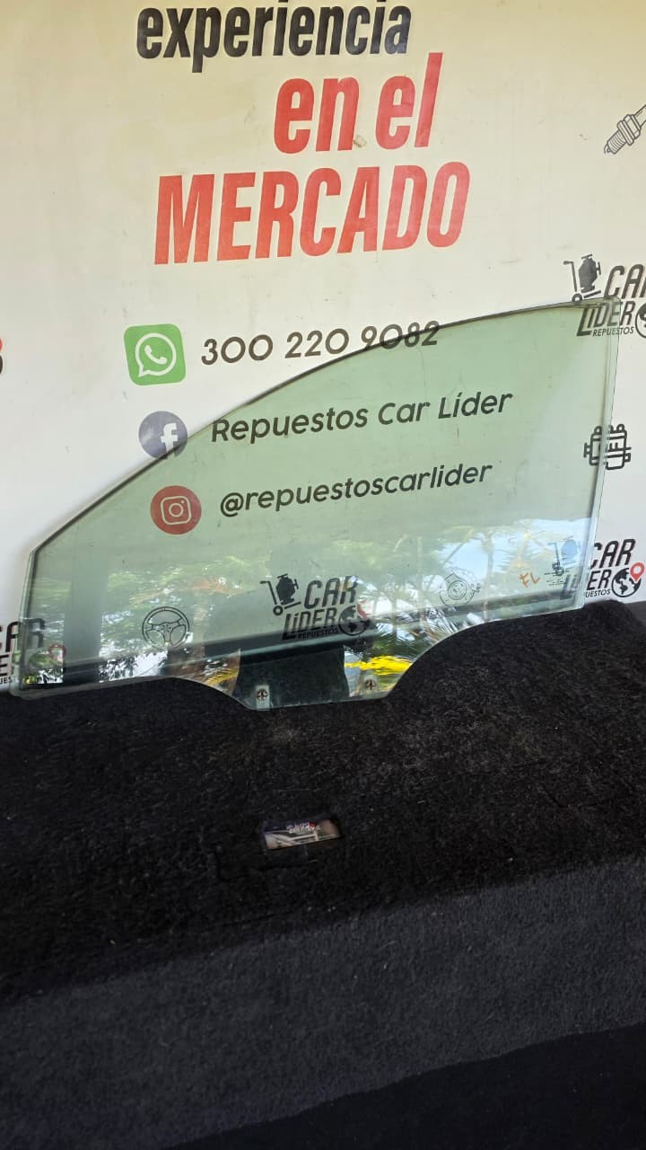 Vidrio Puerta Delantero Izquierdo piloto Chevrolet Optra 1.4 2005 MT