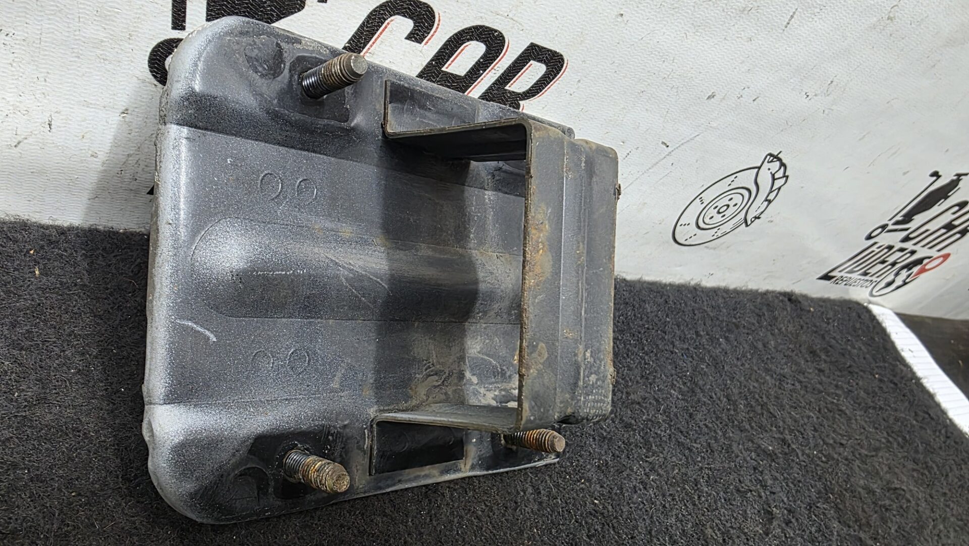 Soporte Alma bumper delantero Izq negro Chevrolet Optra 1.4 2005 MT