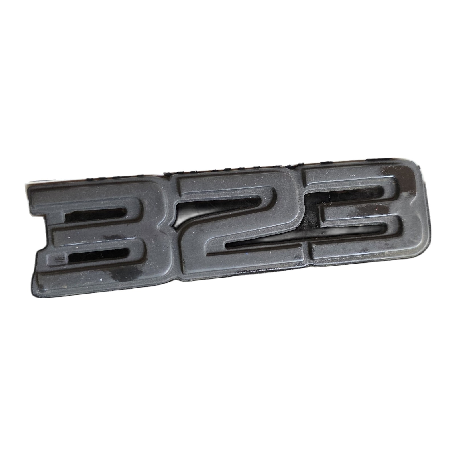 Emblema Numero modelo 323 Mazda 323 1.3 1989 MT